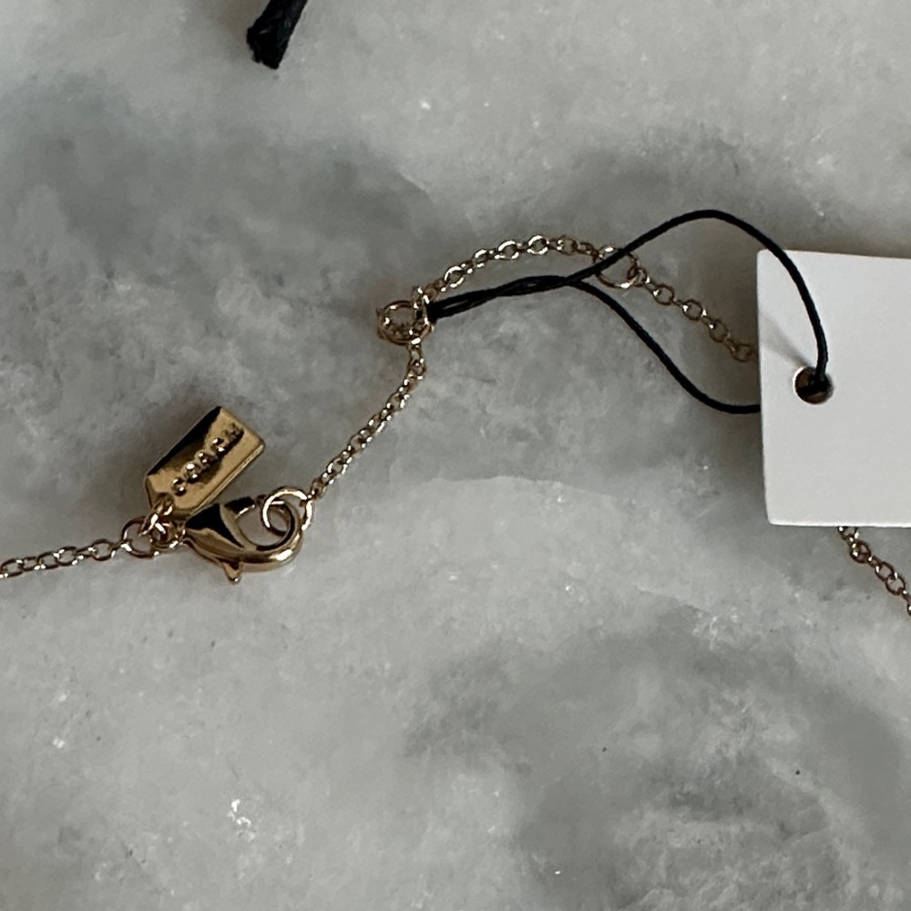 Coach Gold-Tone Heart Necklace - Picture 3 of 4